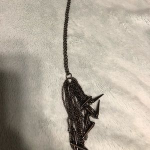Long hematite colored necklace